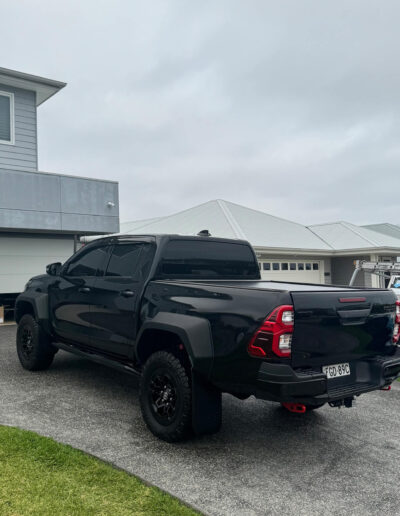 Vehicle detailing work showcasing clean exterior surfaces