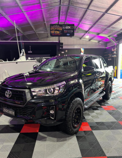 Restored vehicle appearance after full detailing process